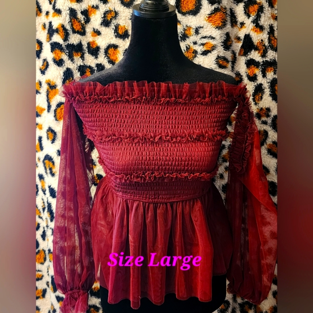 Willow-Root off the shoulder top with sleeves. Got from the Buckle
